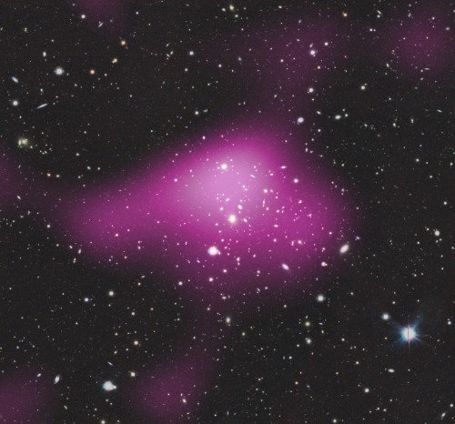 Group of galaxies, with dark matter shown in pink. Image: Kilo-Degree Survey Collaboration, A Tudorica and C Heymans.