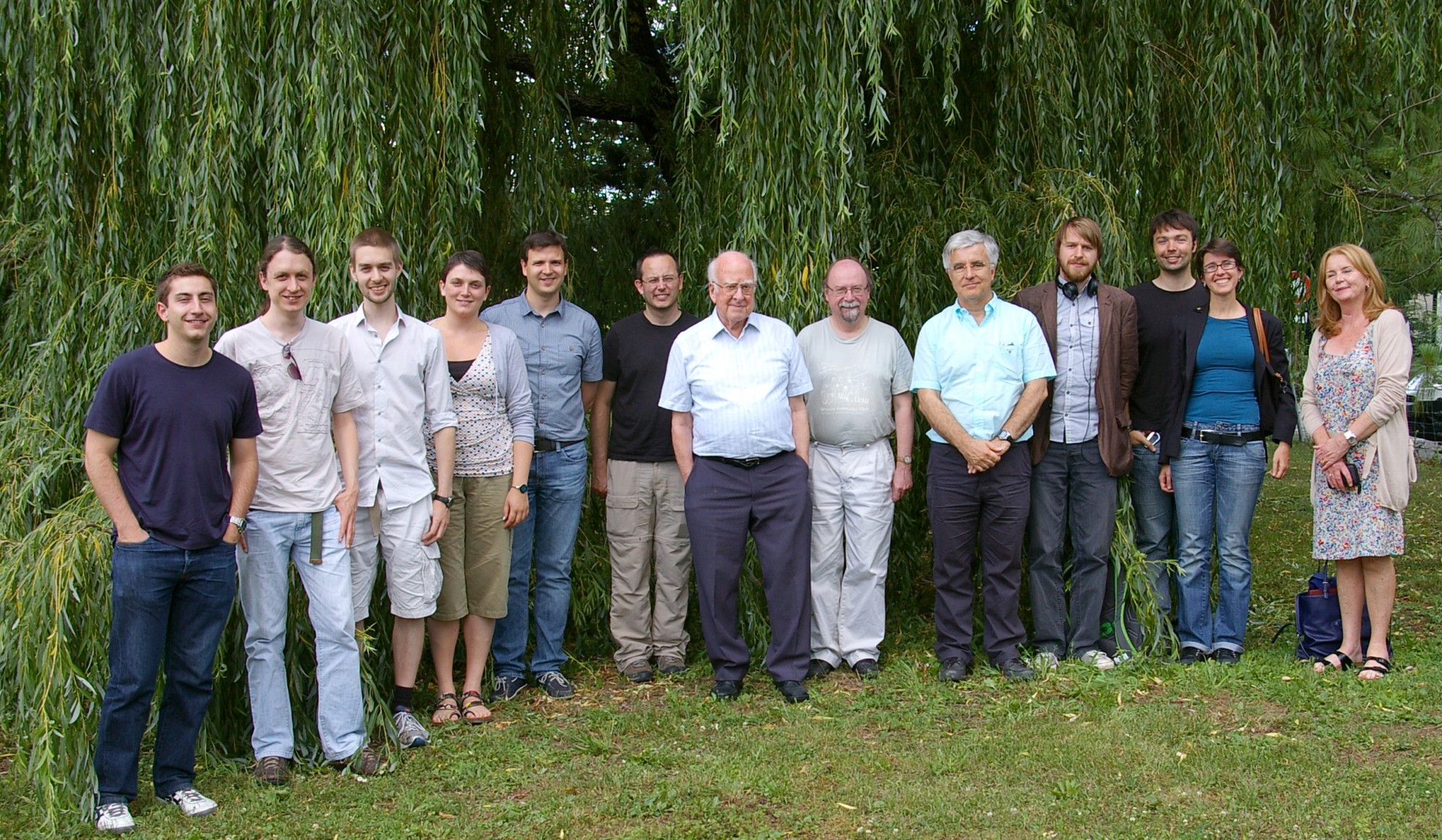 Peter Higgs and PhD student Chiara Debenedetti (4th from left) with other members of the ATLAS team.