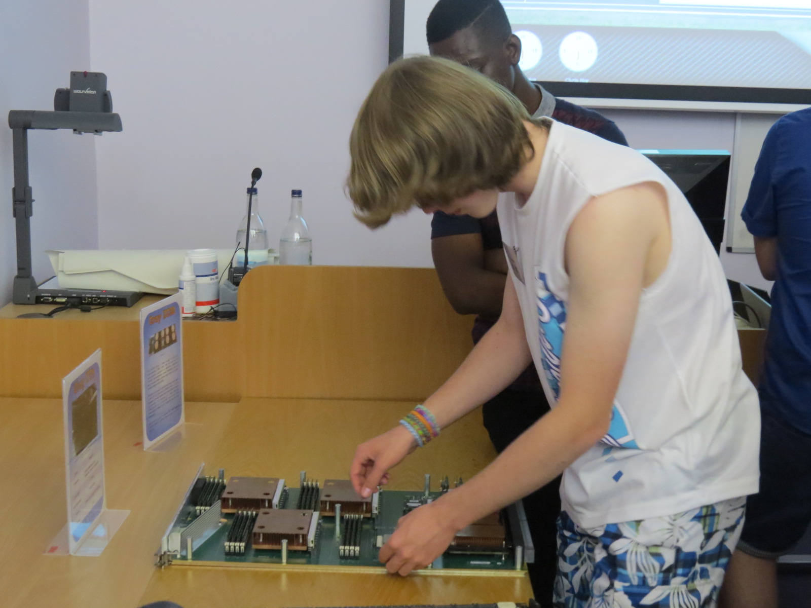 Attendee inspects a Cray XT4 board.