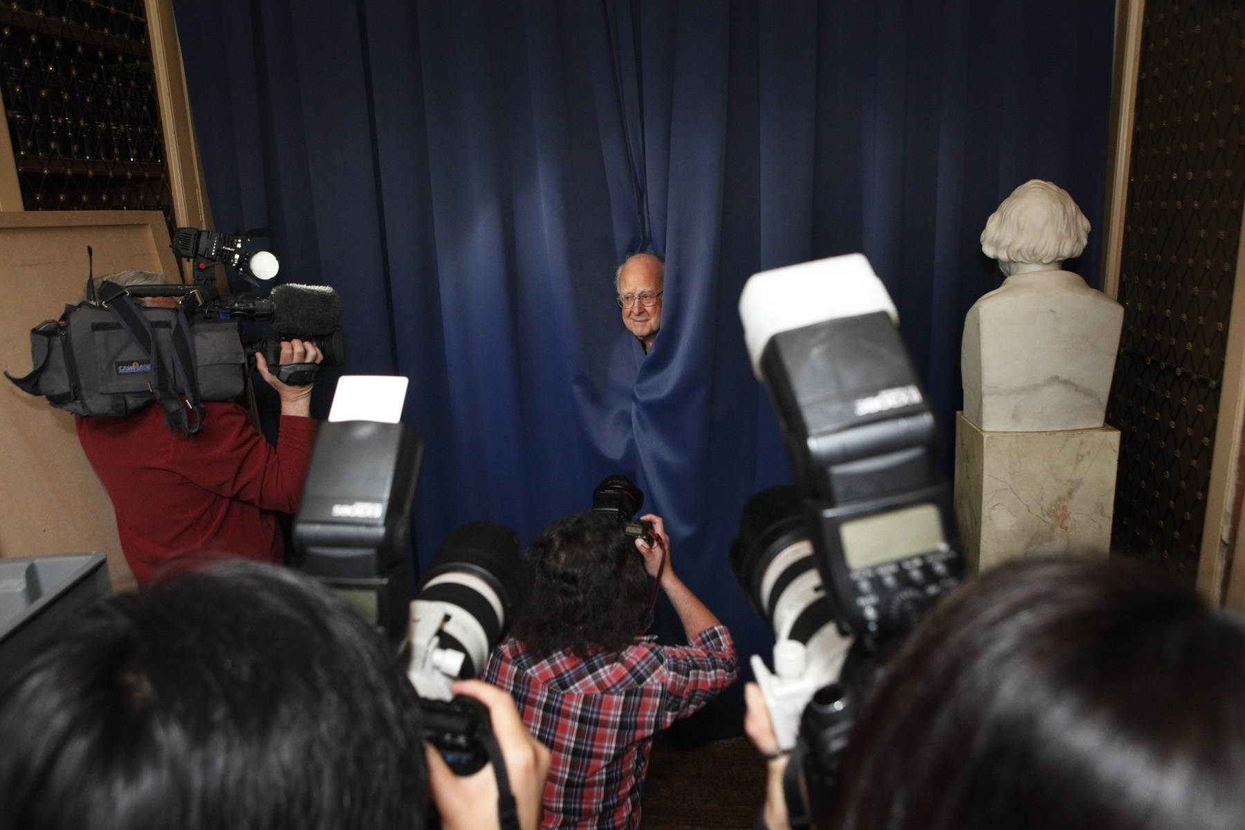 Professor Peter Higgs at the news conference at the University of Edinburgh. Image copyright Graham Clark.