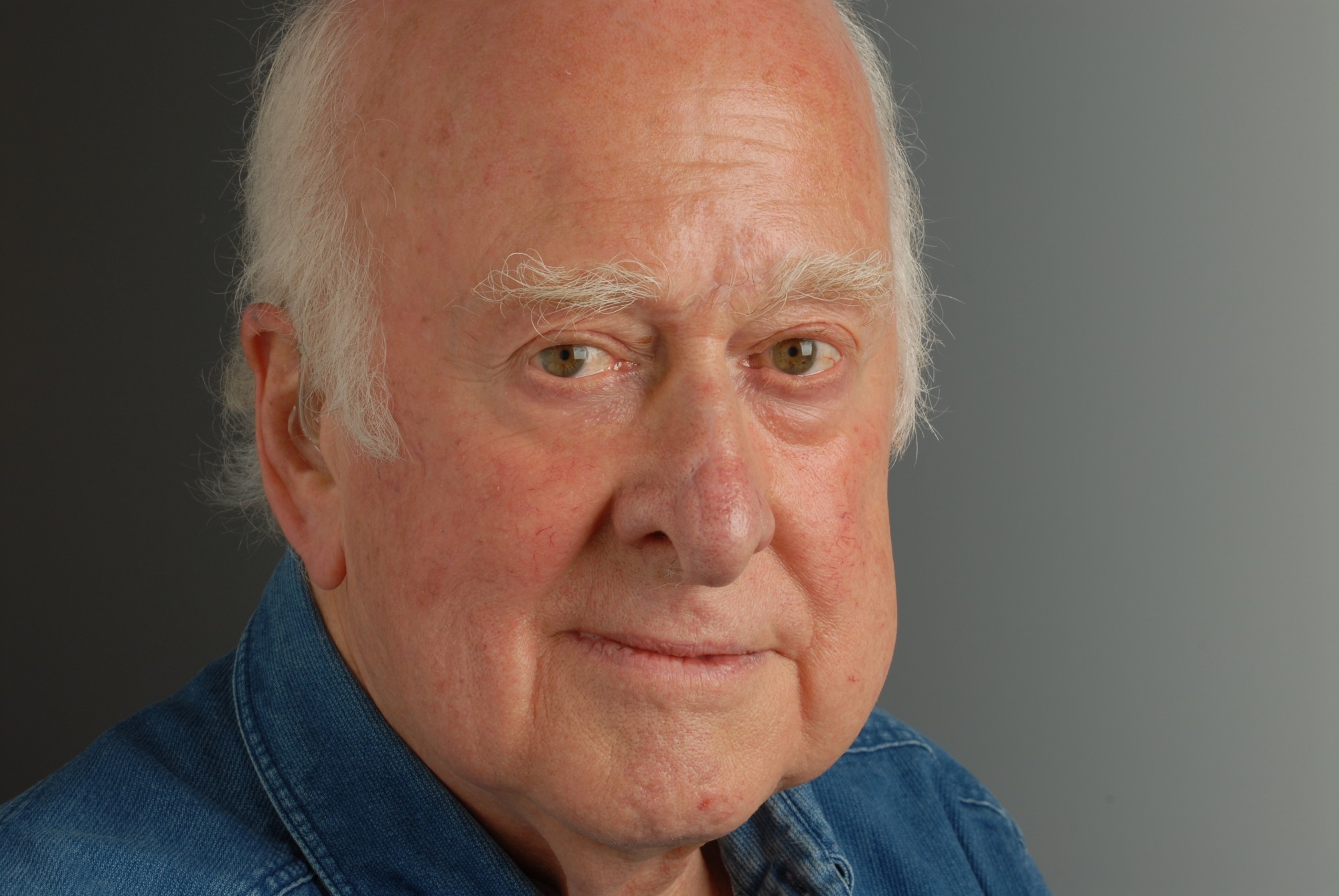 Close-up photographic portrait of Peter Higgs taken by Peter Tuffy. 17 June 2009.