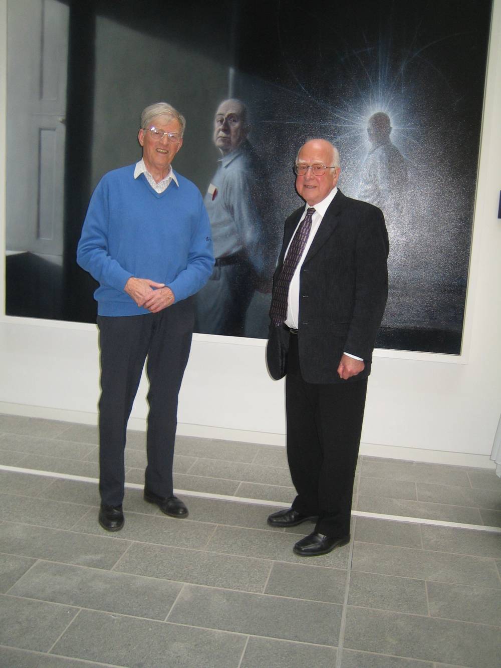 This shows Peter Higgs meeting Ian Chuter, a fellow undergraduate at King&#039;s College London. Ian was in the Informatics Forum by chance on the same day. These photographs are courtesy of Ian Chuter.