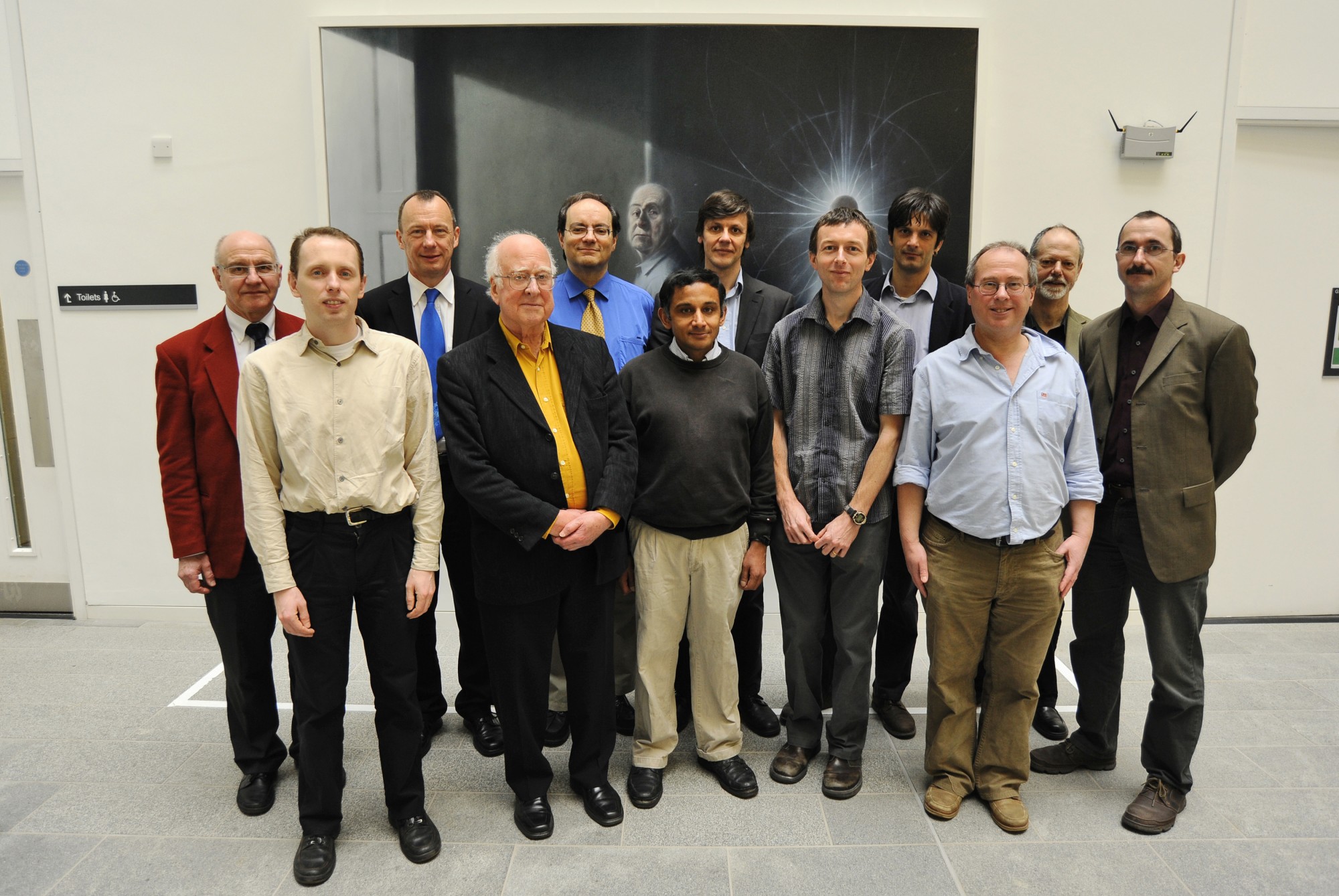 Peter Higgs with members of the Particle Physics Theory group of the School of Physics and Astronomy.