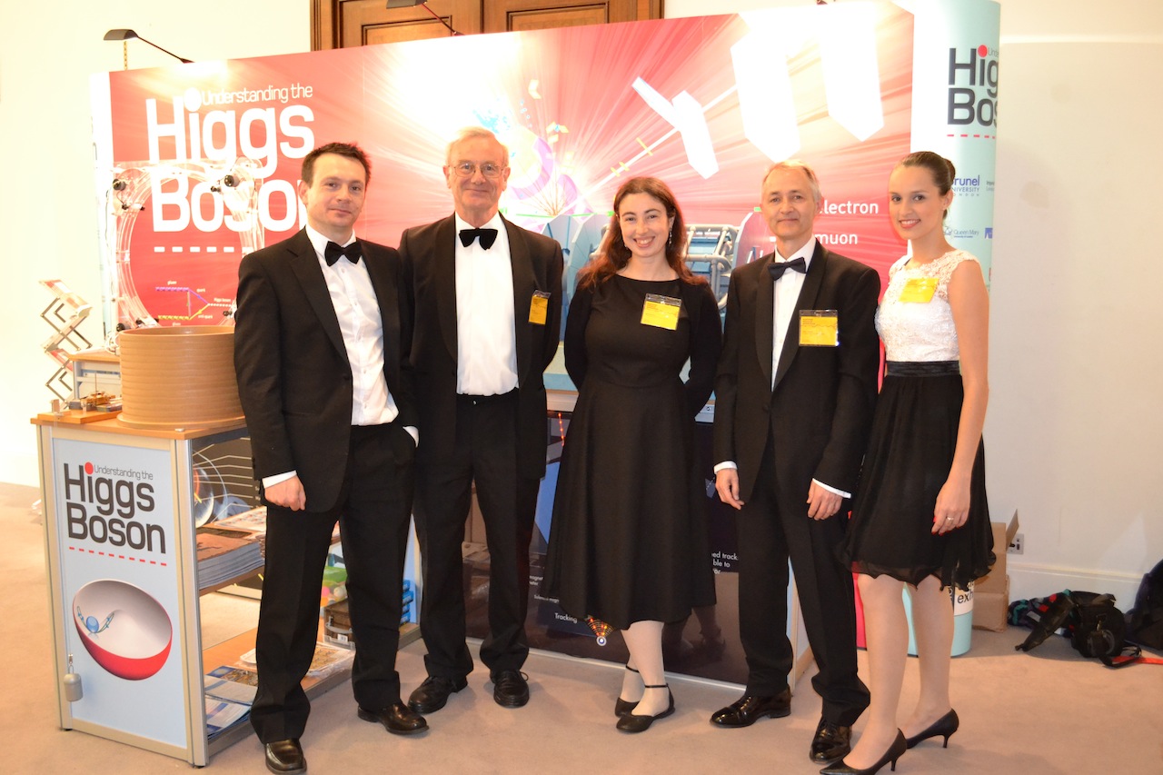 Flavia Dias, Edinburgh Particle Physics Experiment group (on the right), at one of the evening events. The group includes Frank Close (2nd from left), Professor of Physics at the University of Oxford.