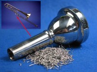 Trumpet mouthpiece made from the new alloy.