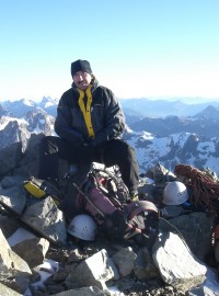 Photograph of Thomas at the top of a mountain in the Ecrins National Parc in the French Alps, Summer 2008. (Photography by Gudrun Heinrich)