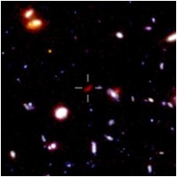 The Hubble Ultra Deep Field showing the location of a potentially very distant galaxy (marked by crosshairs). Credit: Ross McLure (Edinburgh)